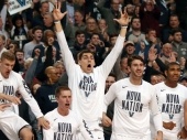 NCAA Basketball Championship: Wolverines in Tough Against Wildcats